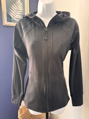 RBX black hooded zip front athletic jacket. Size Medium
